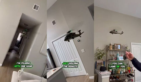 Small indoor RC helicopter flying smoothly inside a home hallway and living room.